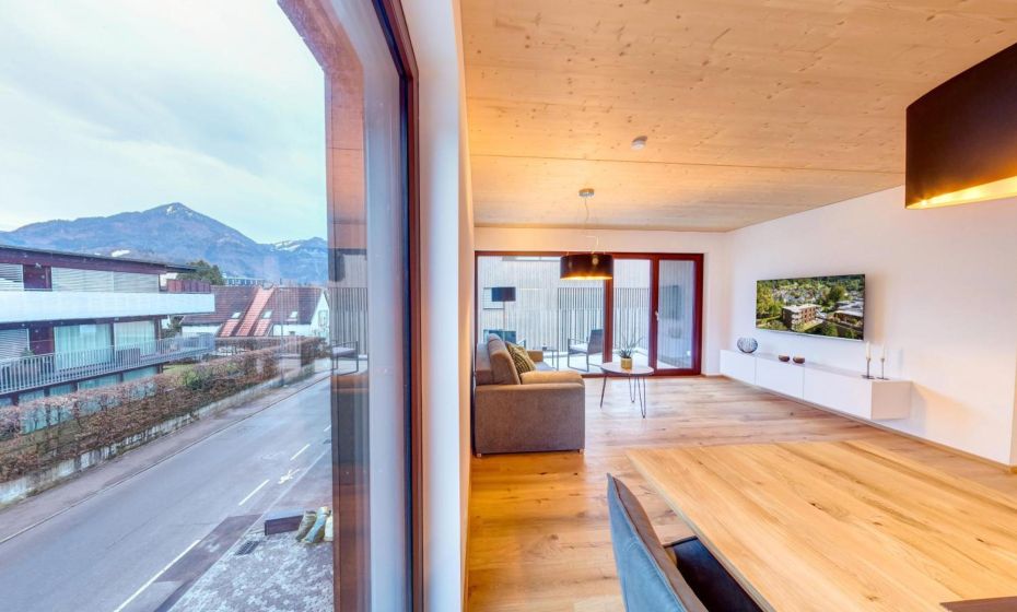 Urban-Apartmenthaus zwischen Berg und See Urban-Apartmenthaus zwischen Berg und See