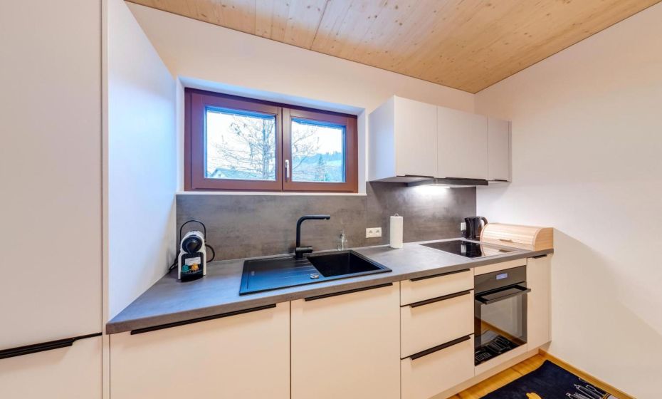 Urban-Apartmenthaus zwischen Berg und See Urban-Apartmenthaus zwischen Berg und See