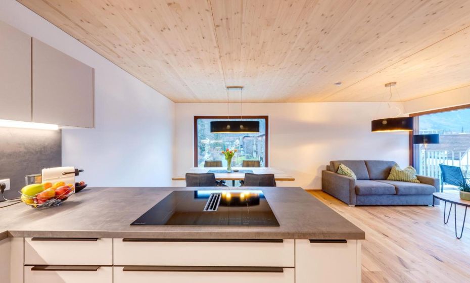 Urban-Apartmenthaus zwischen Berg und See Urban-Apartmenthaus zwischen Berg und See