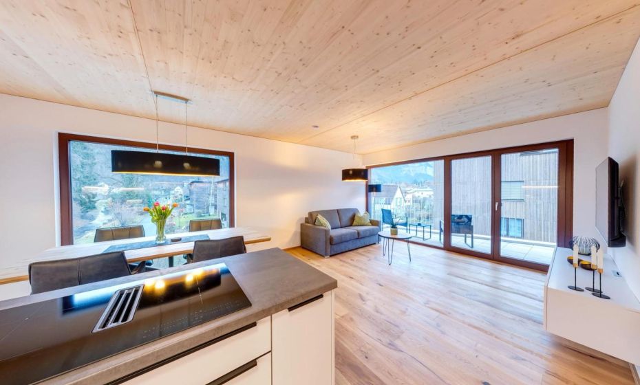 Urban-Apartmenthaus zwischen Berg und See Urban-Apartmenthaus zwischen Berg und See